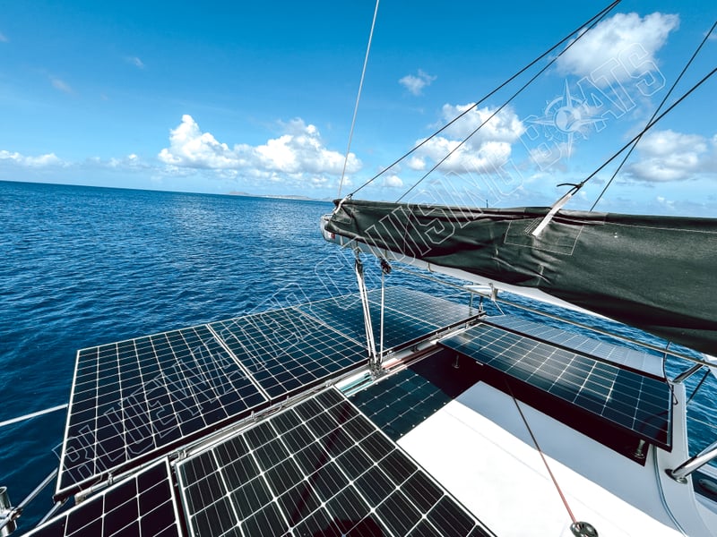 Solar panels on the deck of a 2018 Lagoon 42-2 catamaran, showcasing eco-friendly features and a spacious layout for cruising.