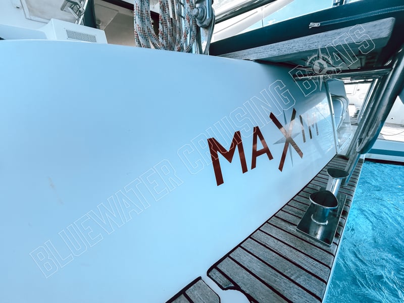 Transom view of a used 2018 Lagoon 42-2 featuring the name 'MAX' with sleek lines and a well-maintained sugar scoop design.